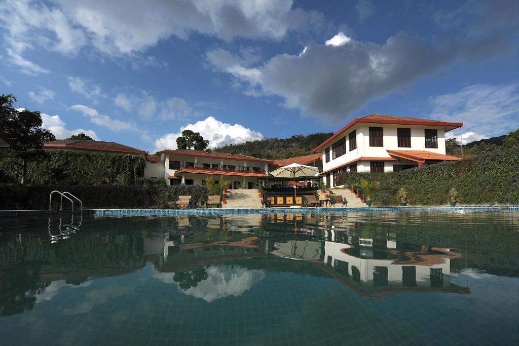 Amritara Ambatty Greens Resort Вираджпет Екстериор снимка